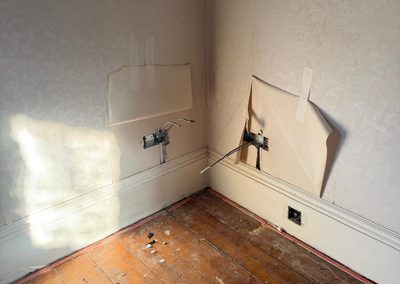 New sockets wired into a bedroom during a rewire